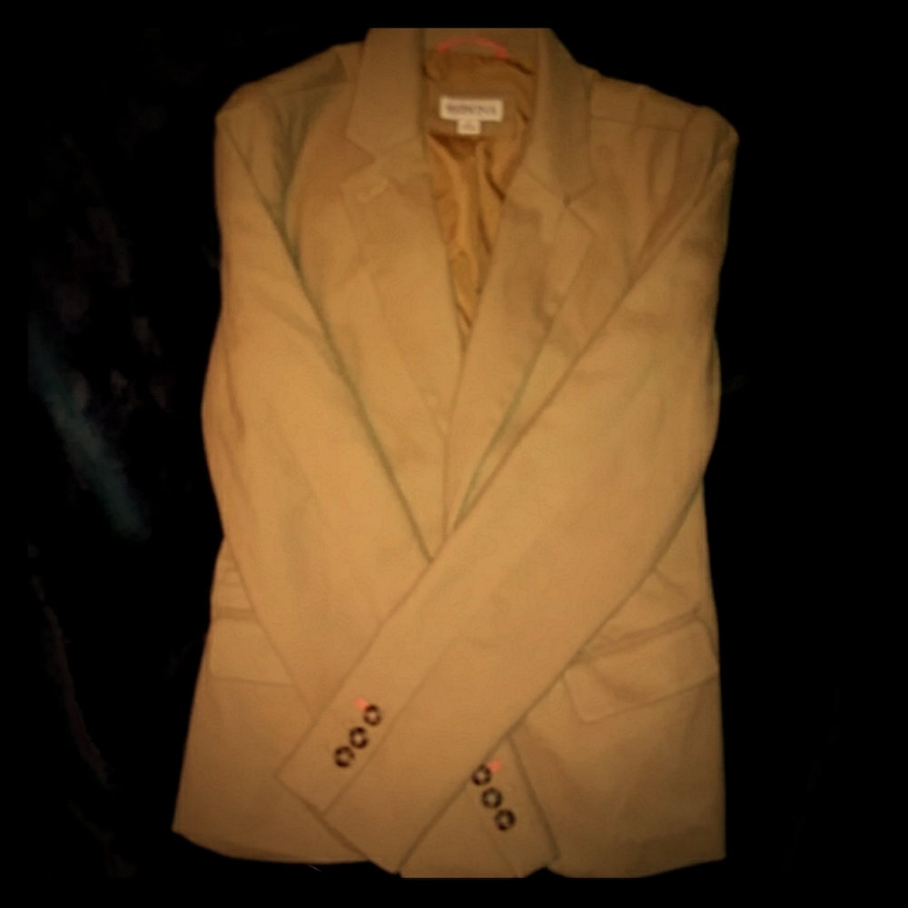 A camel colored blazer.